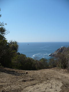 lighthouse and new road and Pacific